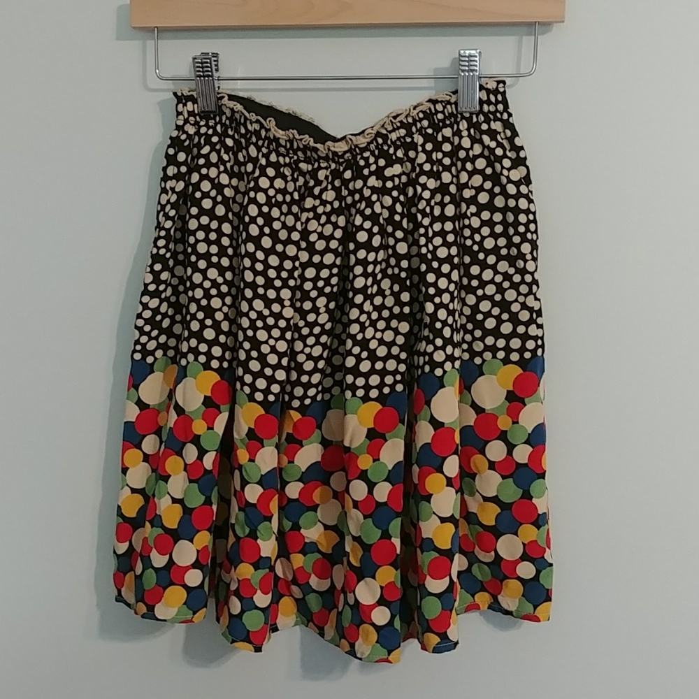 Pleated silk skirt by Corey Lynn Calter